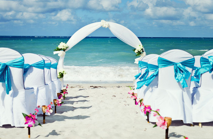 Wedding arbor and chairs at beach